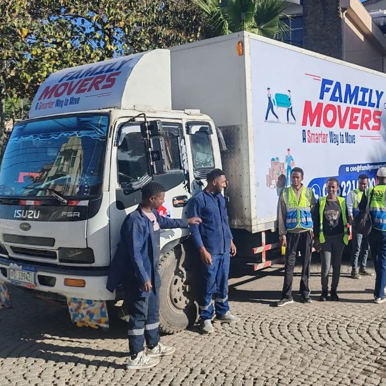 Family Movers Ethio crew and branded truck in Addis Ababa.