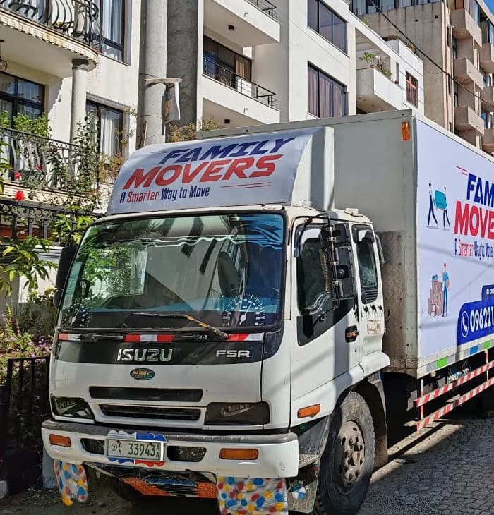 A Family Movers Ethio truck on a residential street in Addis Ababa.